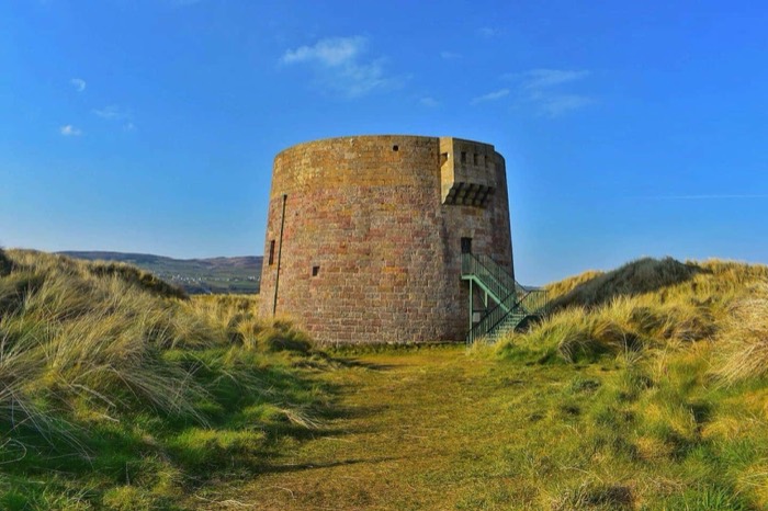 The Martello tower standing among the dunes at Magilligan Point