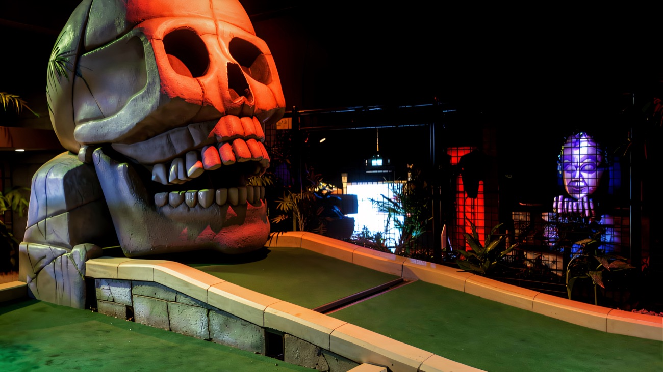 A giant skull looms over the fairway on the adventure course