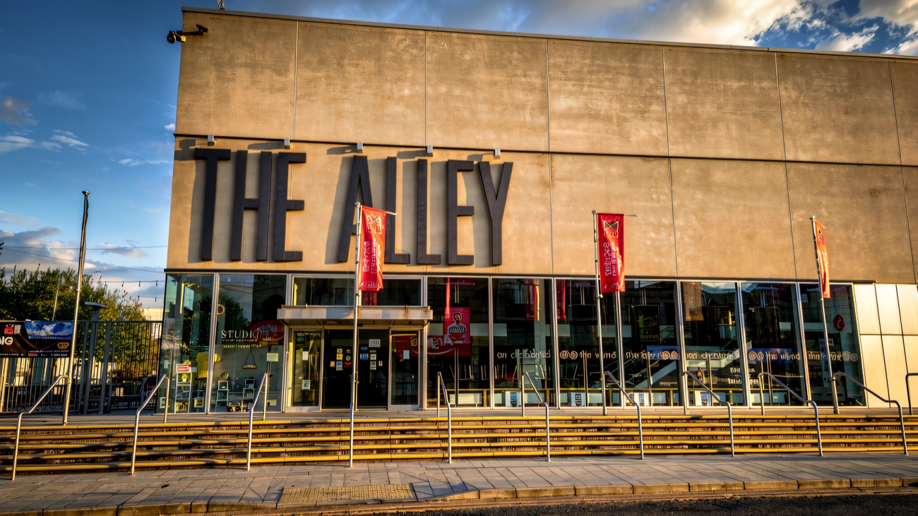 The Alley's striking corner elevation on a bright day