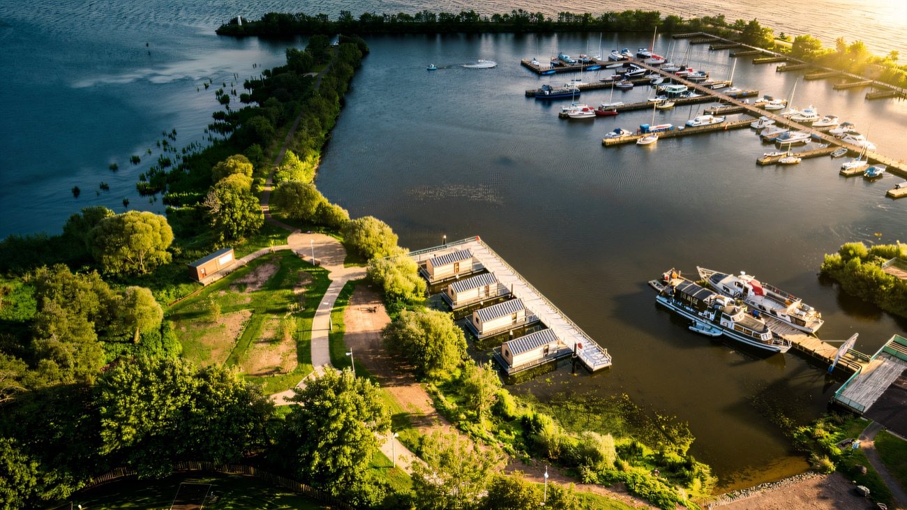 A bird's-eye view over the jetties and the open lough beyond.