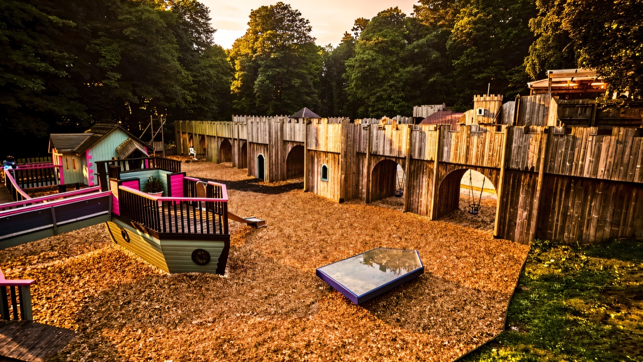 The wooden castle and pirate ship of the woodland adventure playground at Castle Espie