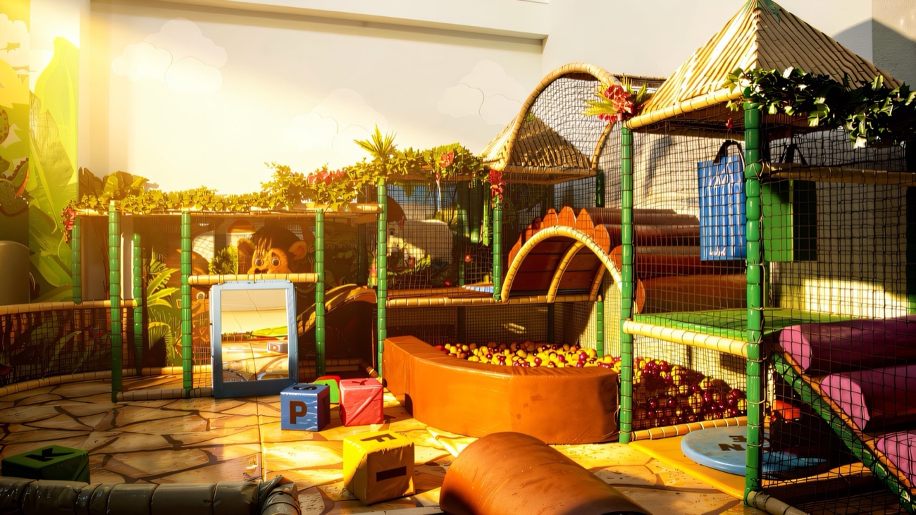 The jungle-themed soft play frame at Indiana Land with netting, slides and a ball pool