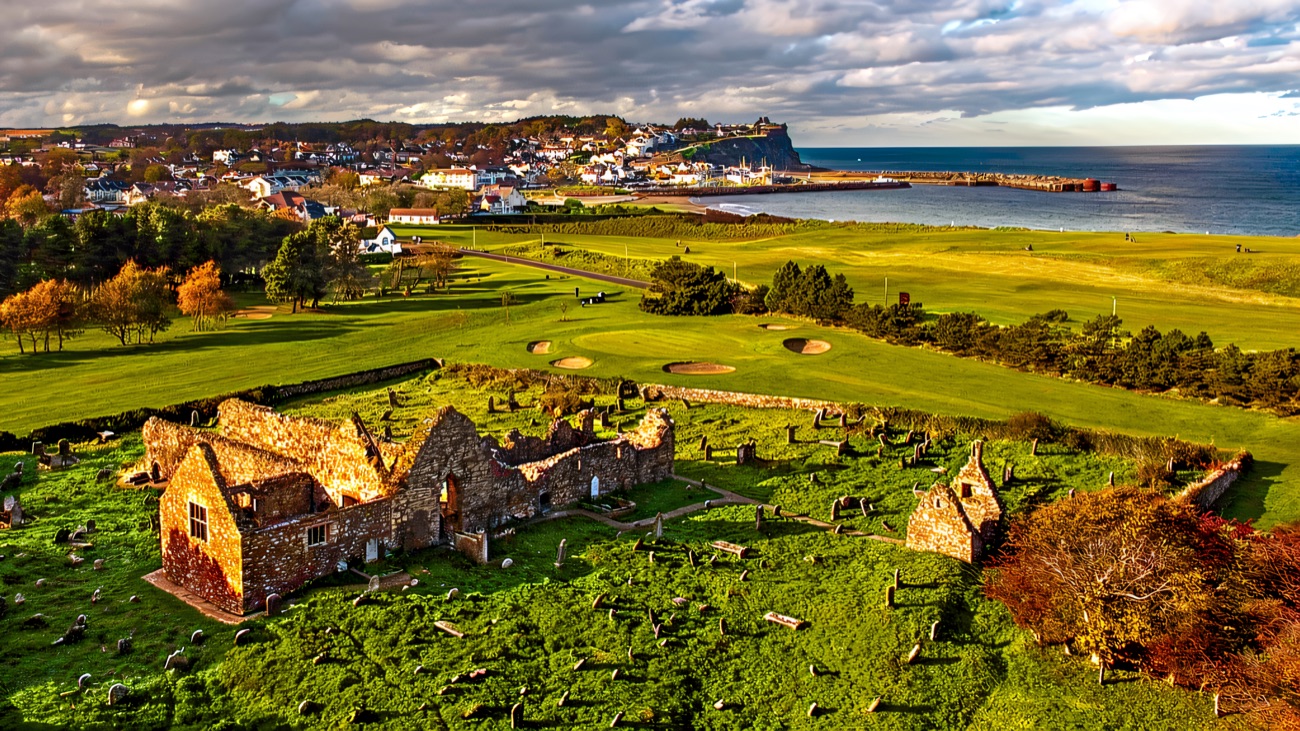 From above, the friary set on the golf links with Ballycastle bay beyond