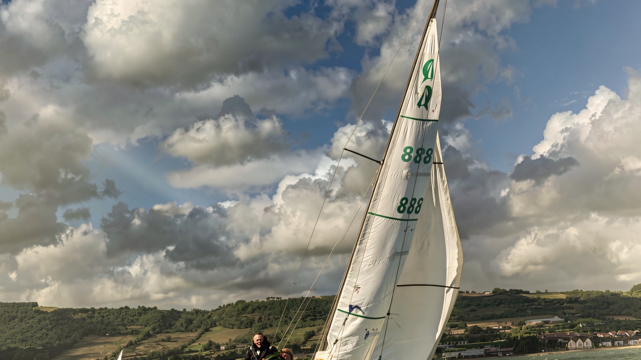 A yacht heeling into a fresh breeze on Belfast Lough