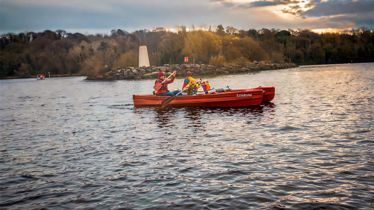 An open canoe gliding past the shoreline markers
