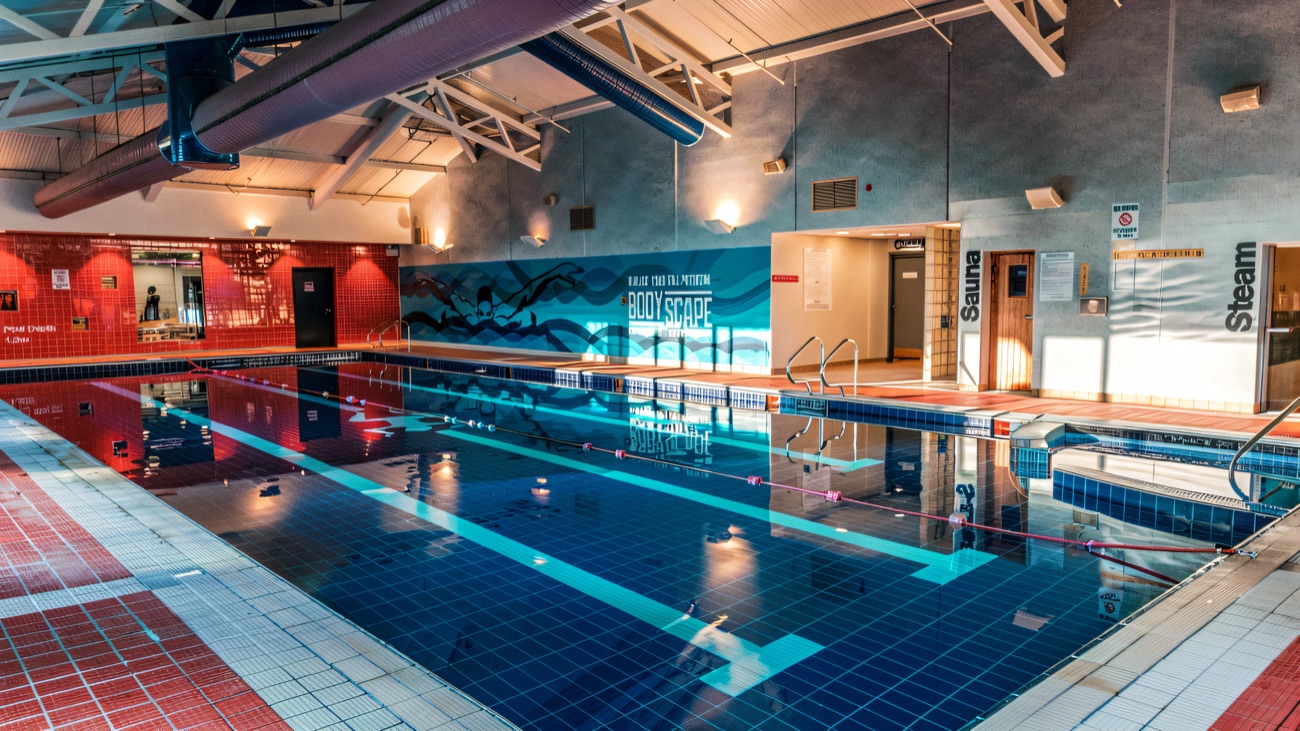 The 20-metre indoor pool with lane ropes and the Bodyscape sign on the far wall.