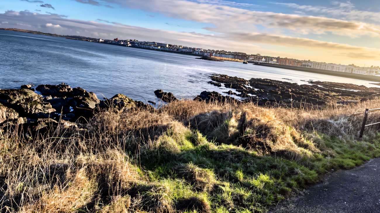 The route curves toward Bangor town across the bay in winter light