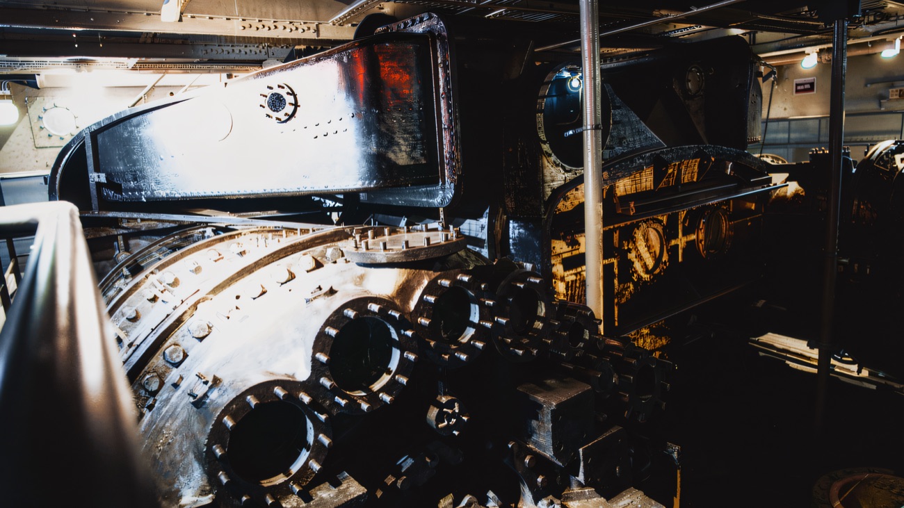 Down in the engine room among the ship's turbines.