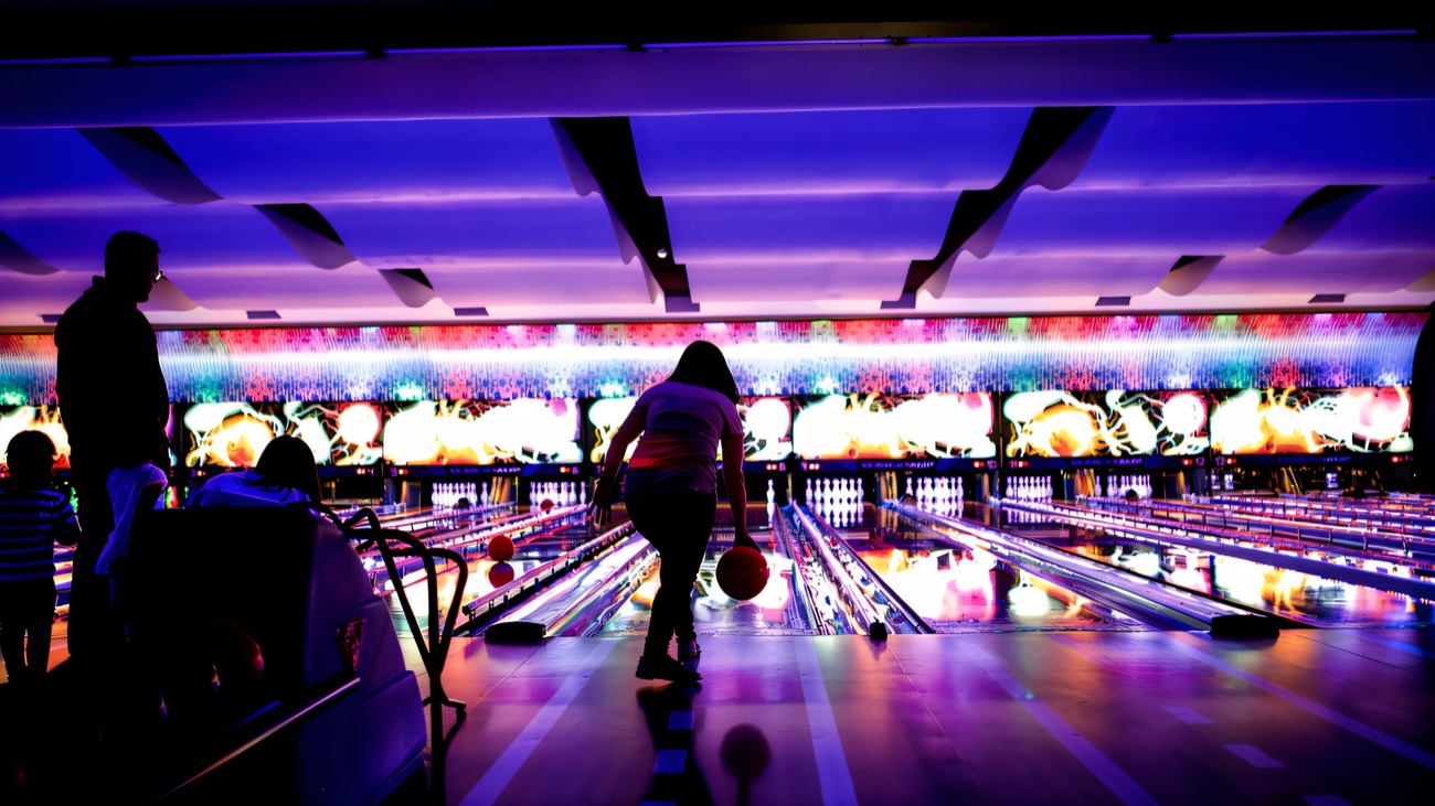 Bowling in full swing under the coloured lights