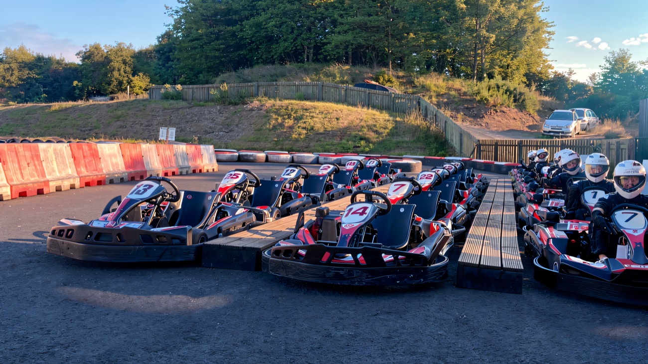 Karts on the grid with drivers waiting for the off
