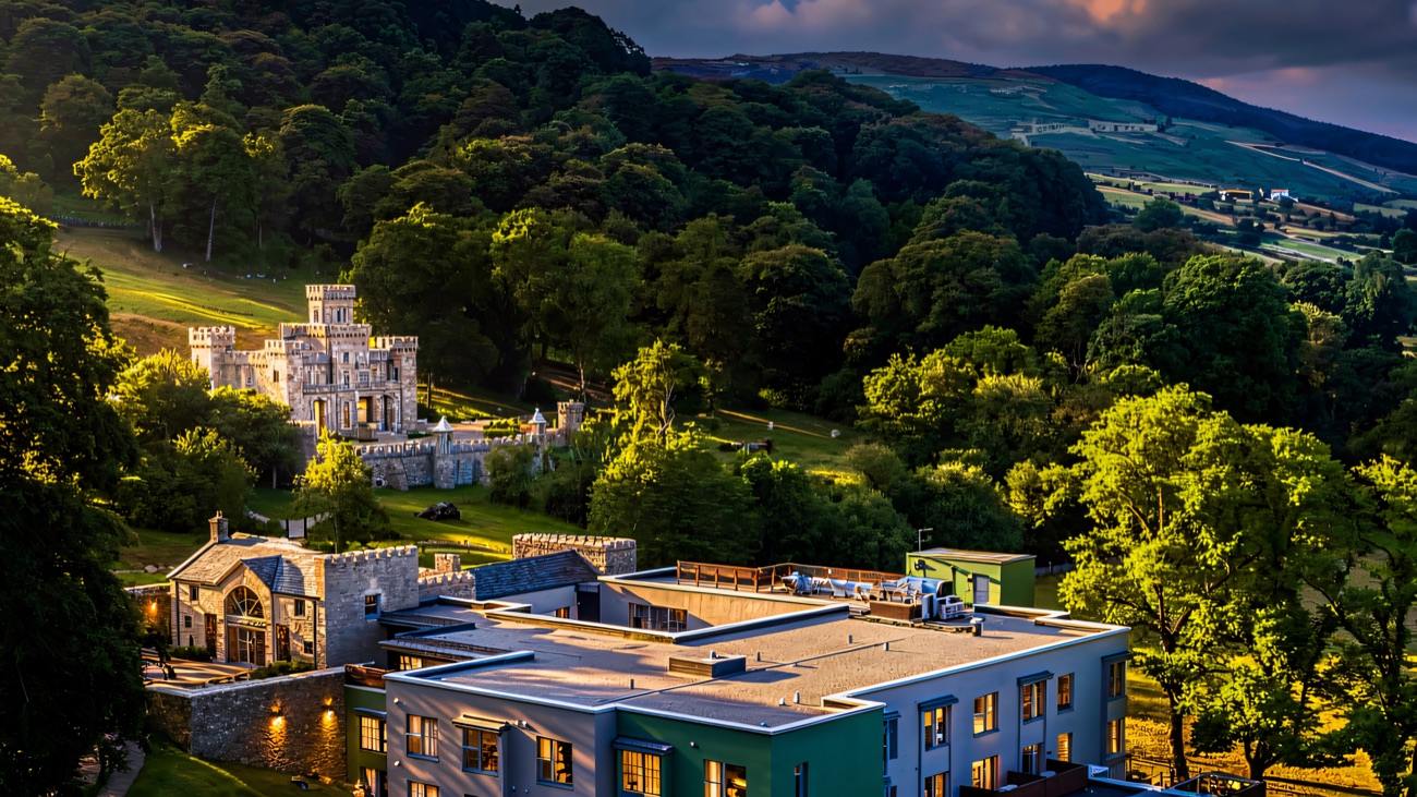 The estate from above, tucked under the wooded slopes of Slieve Gullion with the walled garden below.