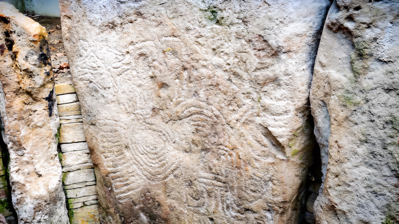 Another orthostat showing the swirling prehistoric rock art the tomb is known for.