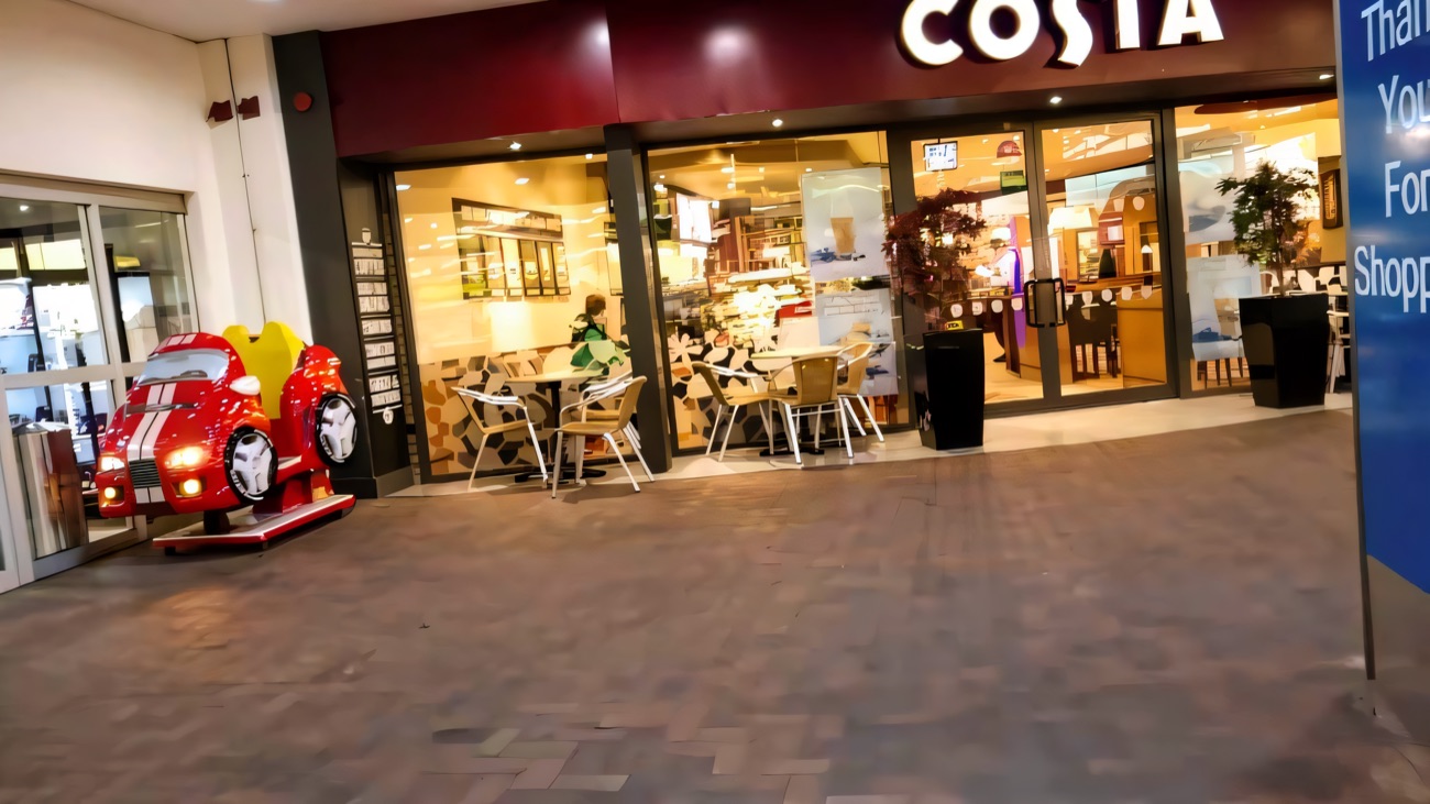 The Costa storefront and a kiddie ride inside the centre