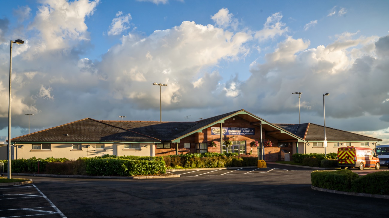 The arena entrance and car park under a big Mid Ulster sky