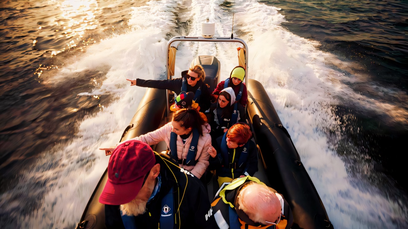The view down into the boat as it races along, a guide pointing out the sights