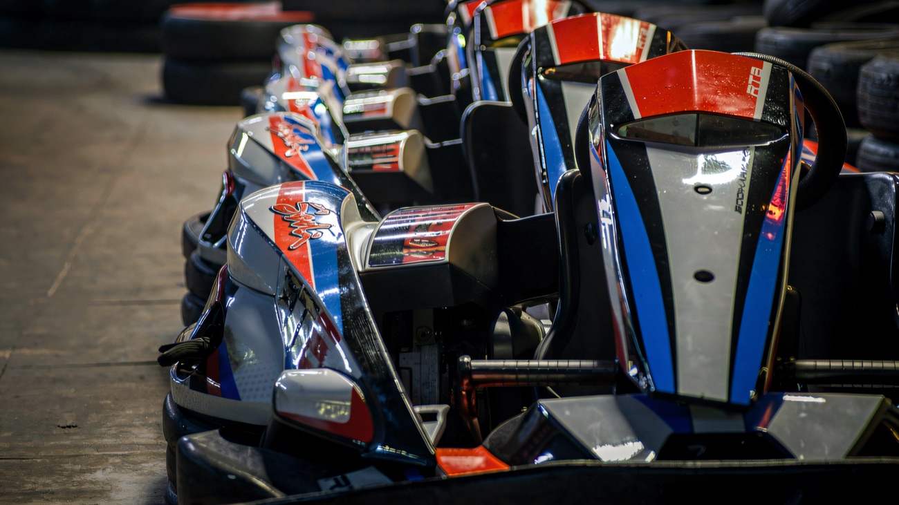 The Need 4 Speed karts lined up ready in the pit lane