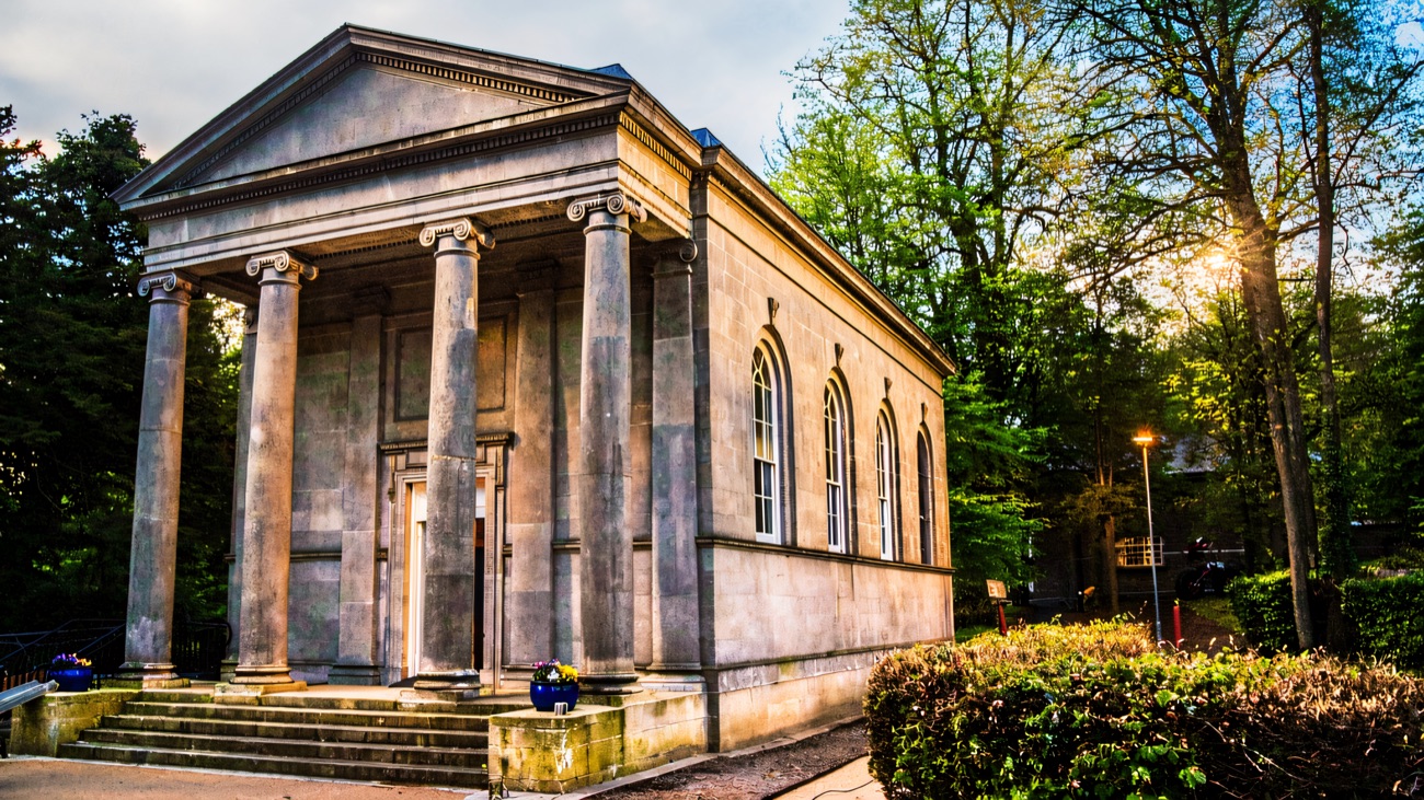 The Primate's Chapel, a small Ionic-columned temple in the trees