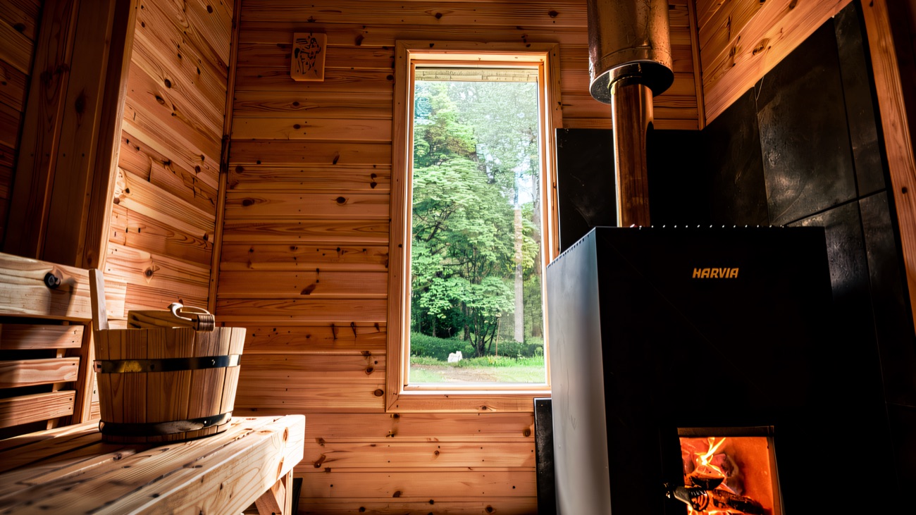 Inside the shack with the wood-burning stove alight