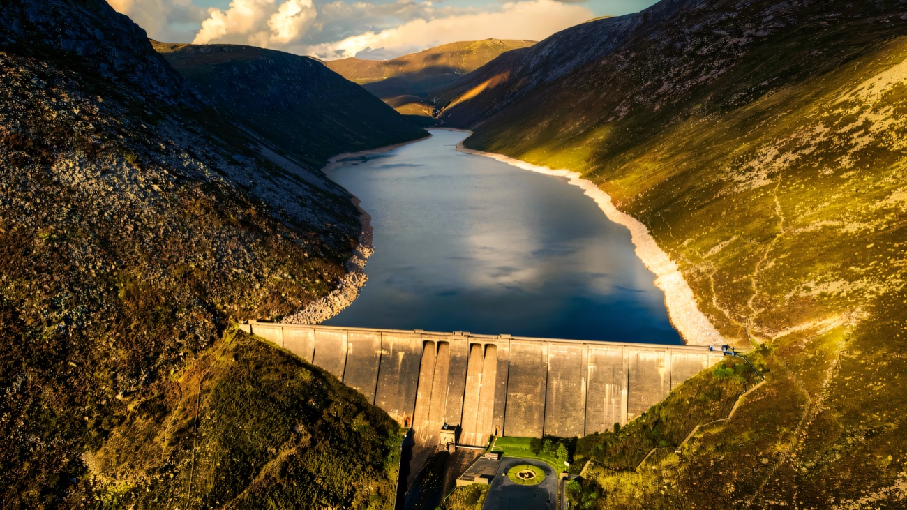 Aerial view of the great dam wall and the reservoir stretching up into the Mourne Mountains