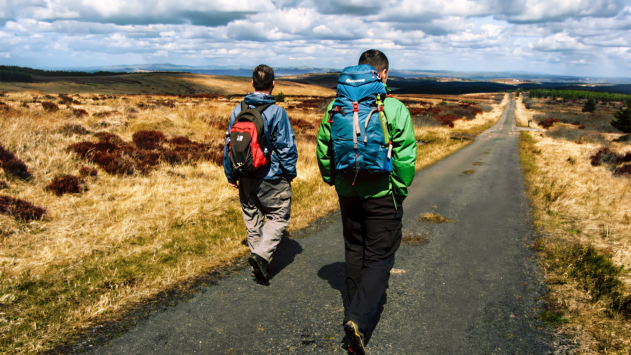 The long straight track running out across the heather uplands
