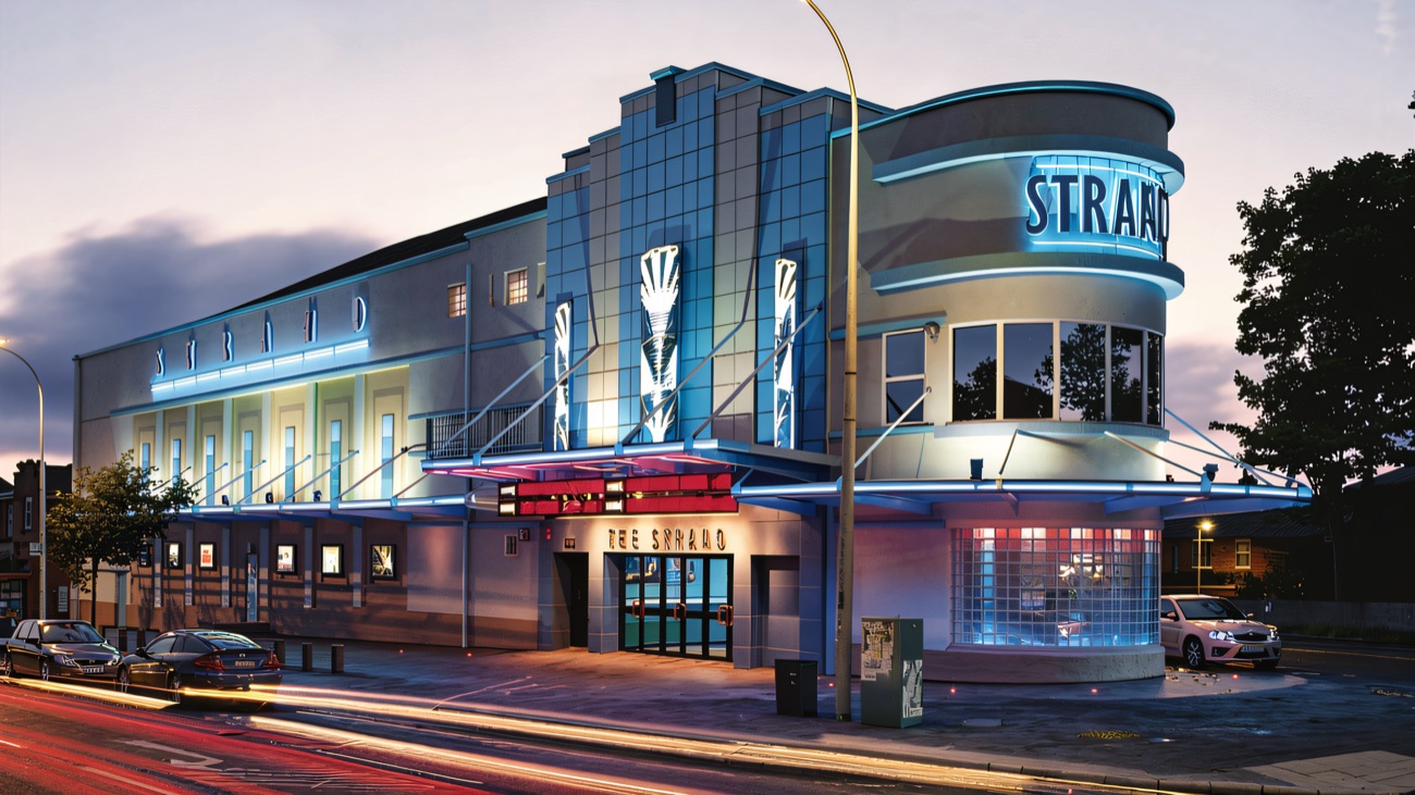The art deco Strand lit in blue neon at dusk