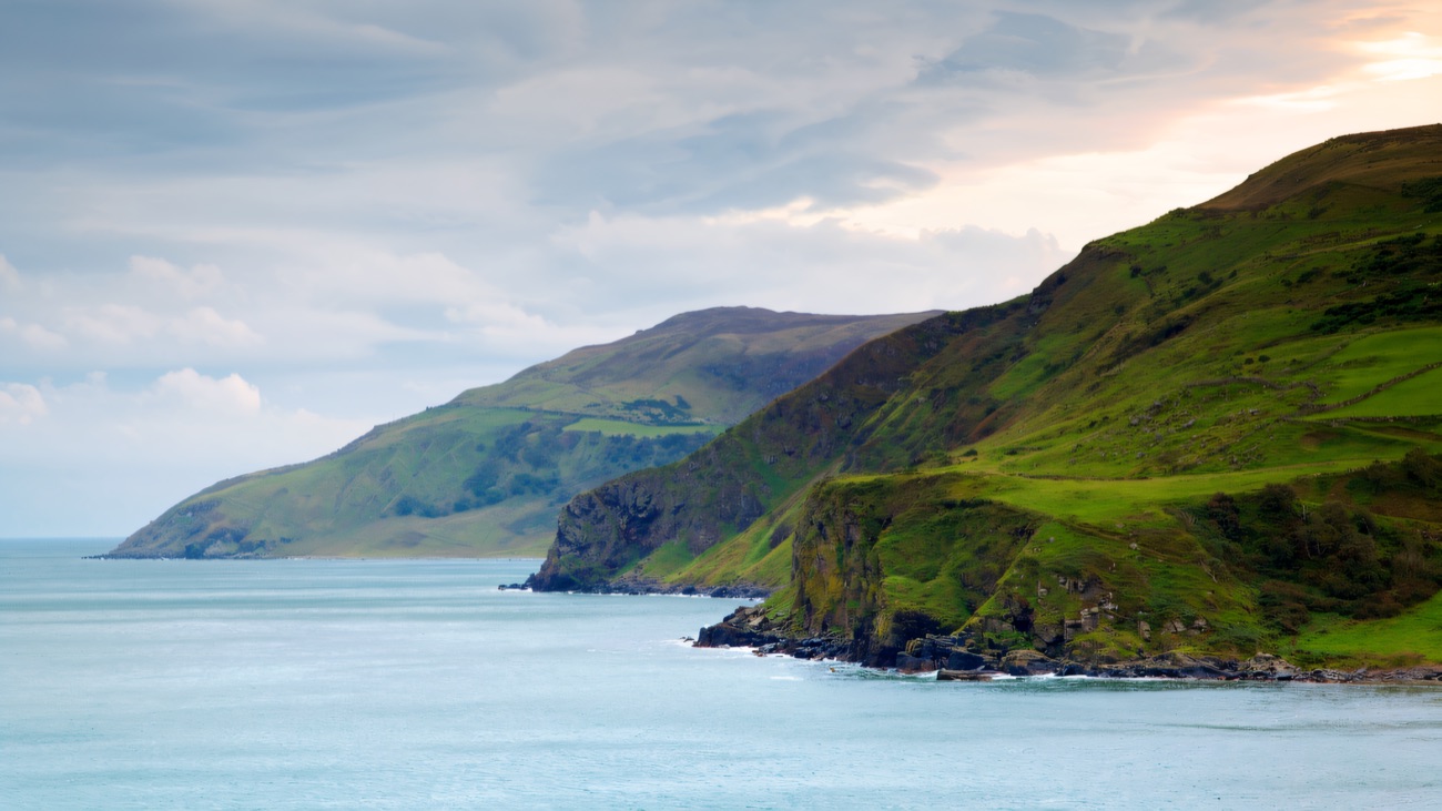 Moody green headlands stepping out toward Fair Head