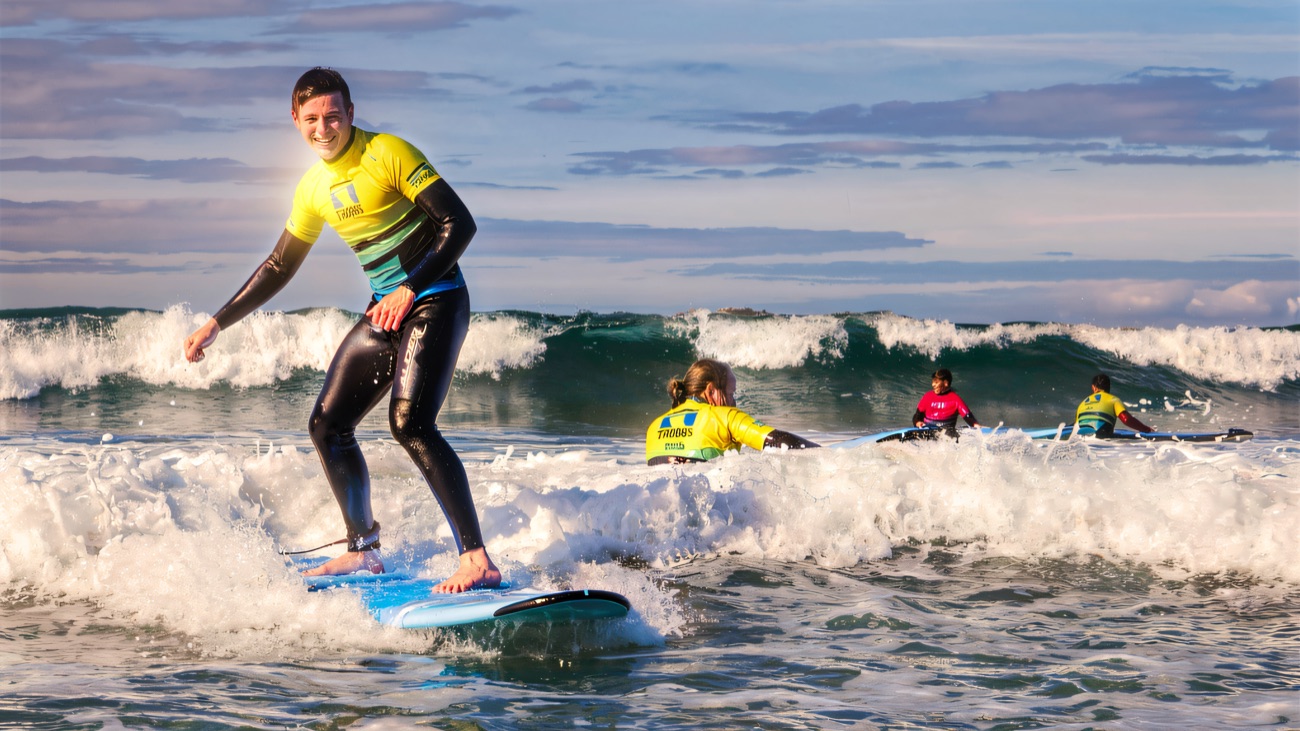 Popped to his feet on a peeling Portrush wave, board humming